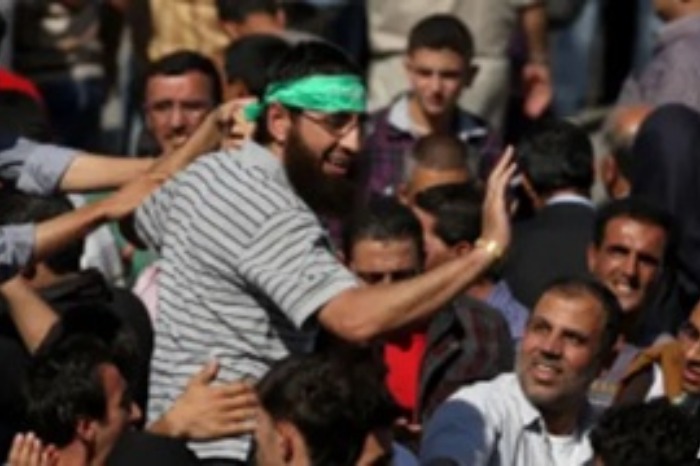 Israel-Palestinian Prisoner Exchange Commences